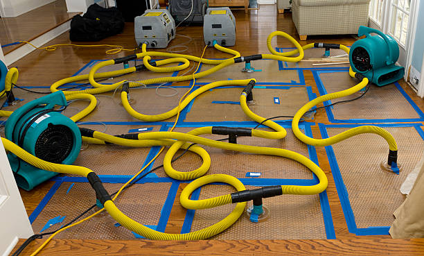Professional Flood Damage Restoration technician working in Vincent, OH